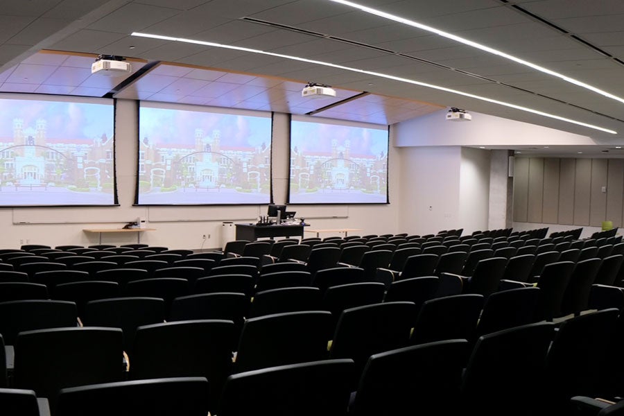 Image of FSU Classroom with projector screens at the front