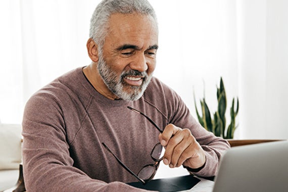 Image of a person working at a computer