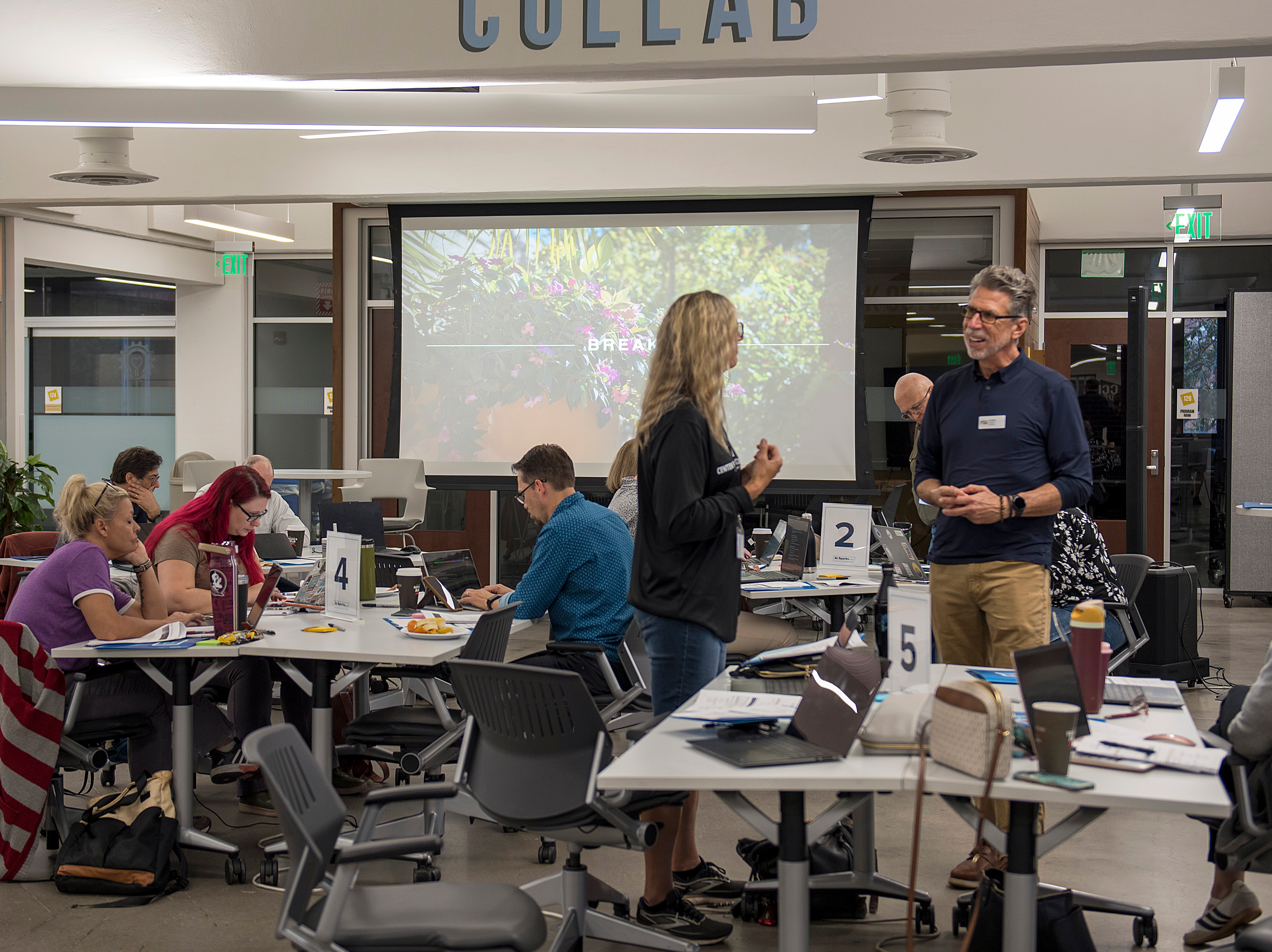 FSU Innovation Hub Founding Director Ken Baldauf chats with a faculty member