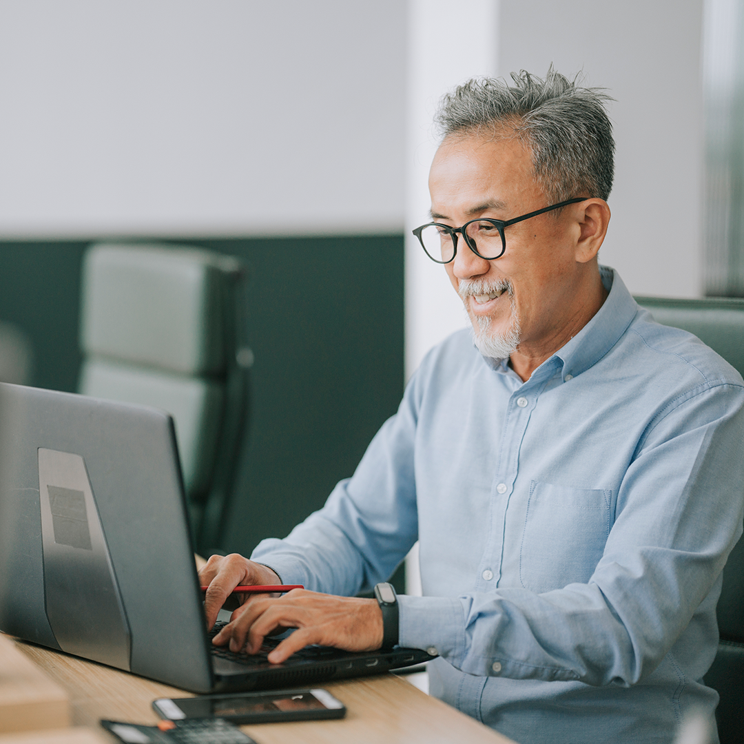 Image of instructor on computer